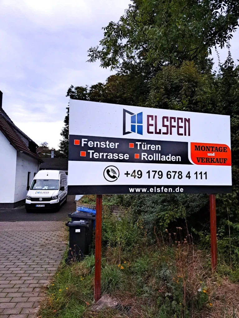 Elsfen Bauelemente Werbeschild für Fenster, Türen, Terrassen und Rollladen mit Firmenfahrzeug – Montage und Verkauf.