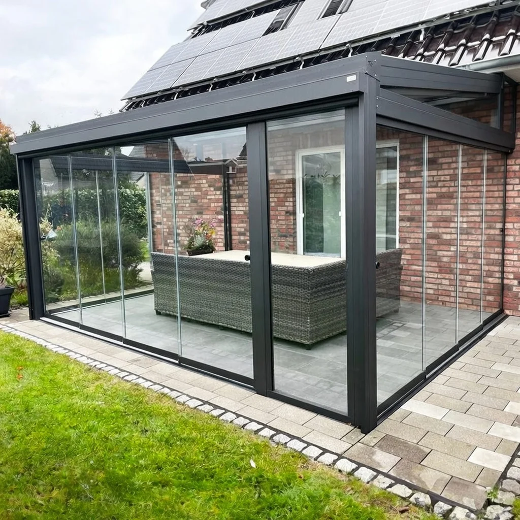 Kaltwintergarten aus Aluminium in Anthrazit am Klinkerhaus in Leverkusen