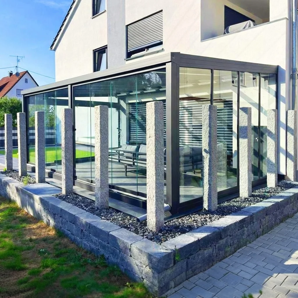 Kaltwintergarten als Ecklösung aus Aluminium und Glas in Köln